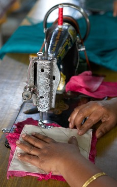 Sewing is just one way that Families For Children creates income. On the top floor of a three-story walk up building on the grounds is the Women’s Co-op. The whirring of fans competes with the whirring of the pedal-powered sewing machines.