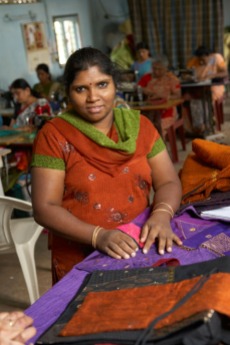 Mano, 32, is the Women’s Co-op manager, overseeing seven seamstresses. She arrived at 14-years-old after her mother had committed suicide unable to continue with an abusive husband. She and her brother were placed on a farm as bonded laborers to pay off the father’s debts. FFC found Mano and her brother through a hospital. FFC helped her find her talent in a batik and bag making course.