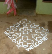Each morning a fresh Welcome is drawn in chalk at the door to the Families For Children office.